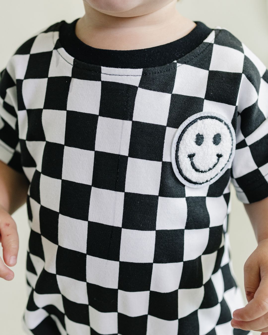 LPK Short Sleeve Bubble Romper - Checkered Smiley Black