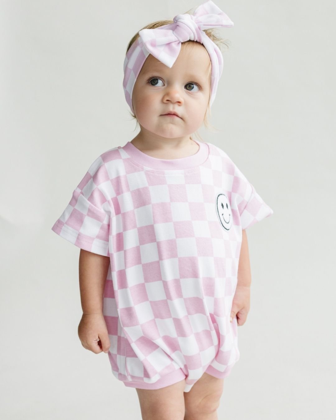 LPK Short Sleeve Bubble Romper - Checkered Smiley Pink