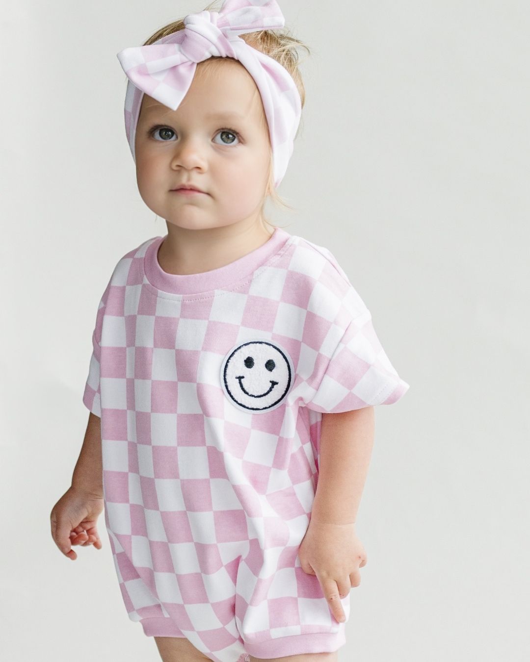 LPK Short Sleeve Bubble Romper - Checkered Smiley Pink